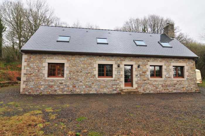 UNDER OFFER AHIN-SP-001055 Nr Mortain 50140 Delightful woodland setting for this smart modern house in Normandy, hidden in the countryside but within 5 minutes drive of a town with all facilities. 11,972m²