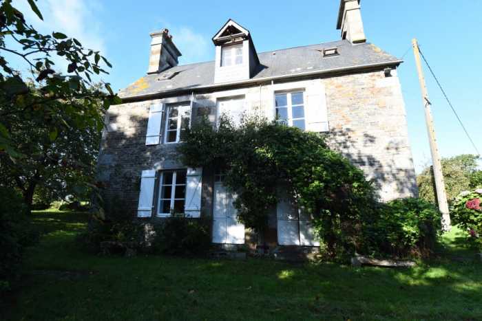 UNDER OFFER AHIN-SP-001470 Nr Vire 14500. Delightful stone house with over an acre and pond